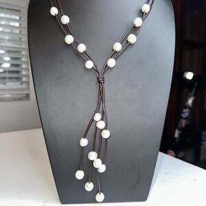 Multi strand brown leather floating pearl necklace